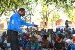 Aaron Maluwa of Museums of Malawi relates stories of the danger of HIV to people in the community. 