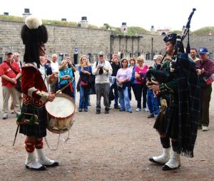Costumed interpreters in Halifax, Nova Scotia, use music to share history and demonstrate cannon firing.
