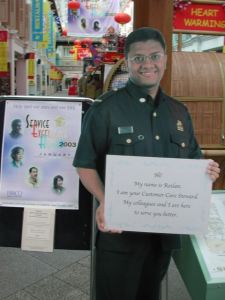 In Singapore they have life-sized posters of local customer service agents with an inviting message. 